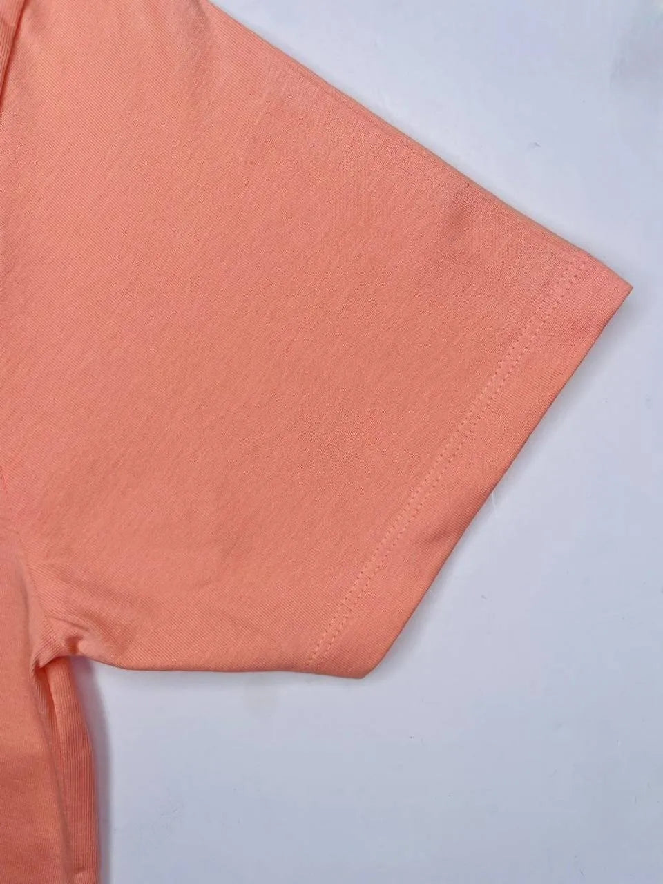 Maxzone graphic tee: Light orange, comfortable, men's fashion.Featuring a unique graphic print, this Maxzone t-shirt is perfect for expressing your personality.