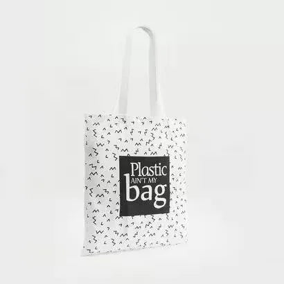 Gloo Planet B printed fold-up shopper bag made from sustainable materials. Bag is folded and displayed against a white background. Gloo Planet B eco-friendly shopper bag with colorful print, folded compactly on a white background. Perfect for reducing plastic waste.