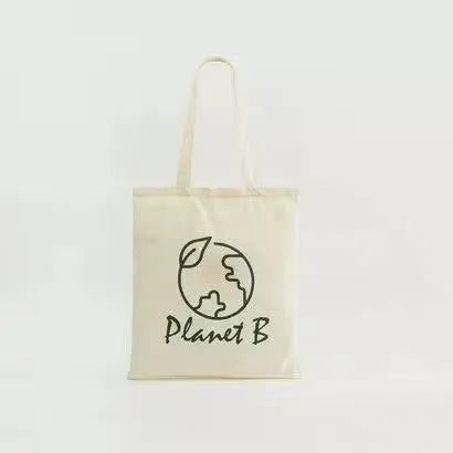 Gloo Planet B printed fold-up shopper bag made from sustainable materials. Bag is folded and displayed against a white background. Gloo Planet B eco-friendly shopper bag with colorful print, folded compactly on a white background. Perfect for reducing plastic waste.