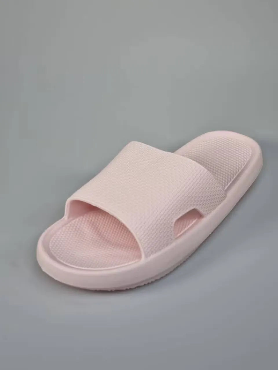 Light pink Summar slippers for women, featuring a plush memory foam footbed and flexible sole. Ideal for indoor and outdoor comfort.