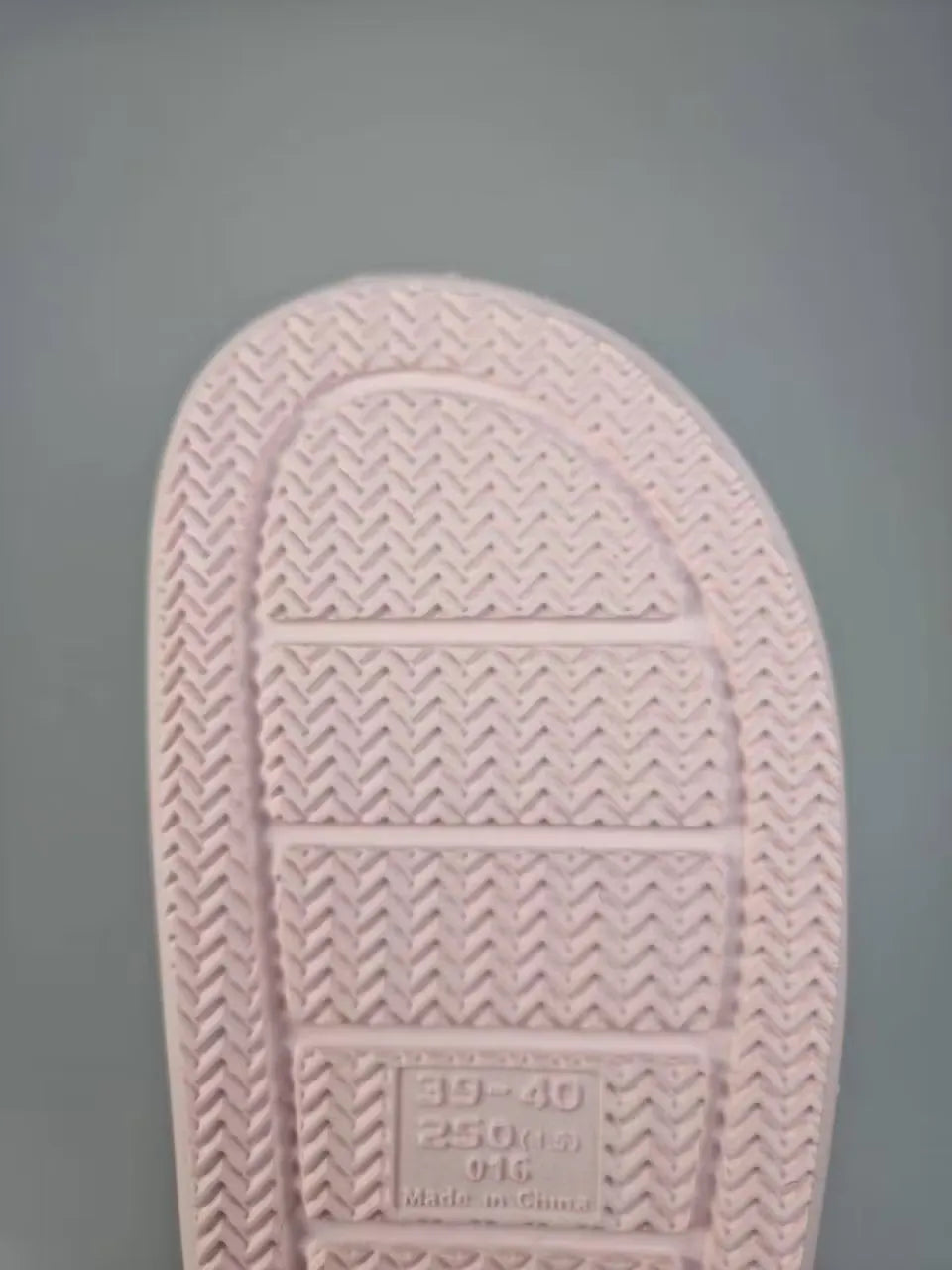 Light pink Summar slippers for women, featuring a plush memory foam footbed and flexible sole. Ideal for indoor and outdoor comfort.