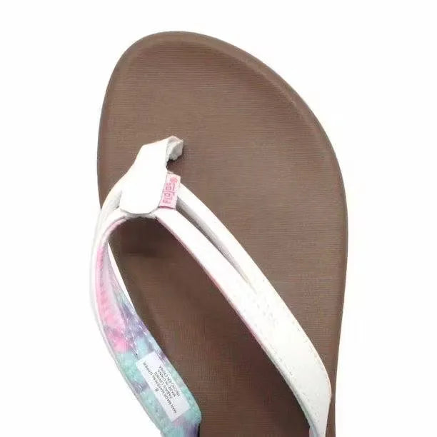 Flojos Margo Flip Flops in white tie-dye, featuring a comfortable memory foam sole and stylish design. Perfect for elevating your summer wardrobe.