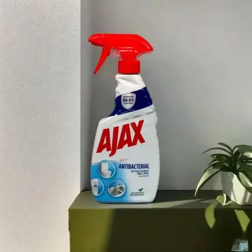 Blue Ajax Multi-Surface Cleaner bottle with 500ml capacity, highlighting its antibacterial formula and bleach-free nature.