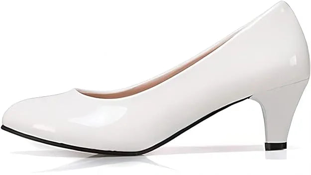 White Kitten Heels: Office to evening, add timeless elegance with these versatile heels (mention size if relevant).Walk confidently, all day long, with the support of a low kitten heel.Kitten heel, versatile, comfortable, office wear, evening wear.