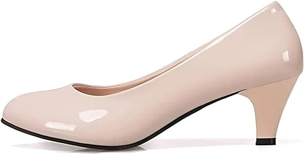 Beige Kitten Heels: Office chic meets comfort with these closed-toe, pointed-toe beauties (mention size if relevant).Walk confidently throughout the day with the perfect height and support.Kitten heel, closed toe, pointed toe, office wear, versatile, comfortable.
