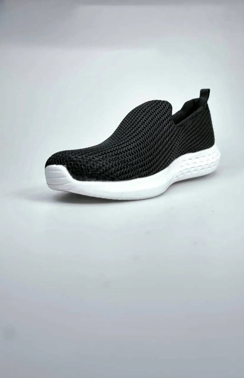 Playboy Black Slip-Ons: Effortless chic meets comfort, perfect for everyday style (mention size if relevant).Slip on instant style and comfort, no laces required.black, comfortable, chic, everyday wear, versatile.