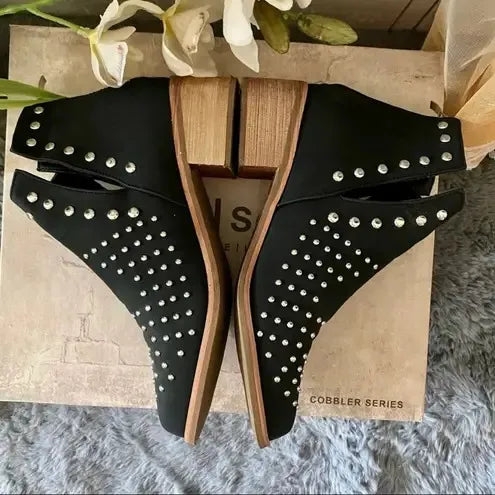 Black Studded Ankle Boots: Elevate your style with edgy & versatile footwear.Pair these versatile boots with dresses, jeans, or skirts.Black, studded, ankle, fashion, trendsetting, comfortable.