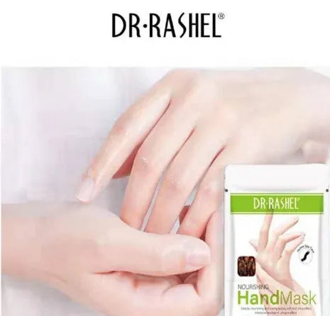 Close-up photo of a pair of hands wearing white Dr. Rashel Argan Oil Nourishing Hand Masks. Hands rest on a spa-like surface with calming elements like stones or greenery.