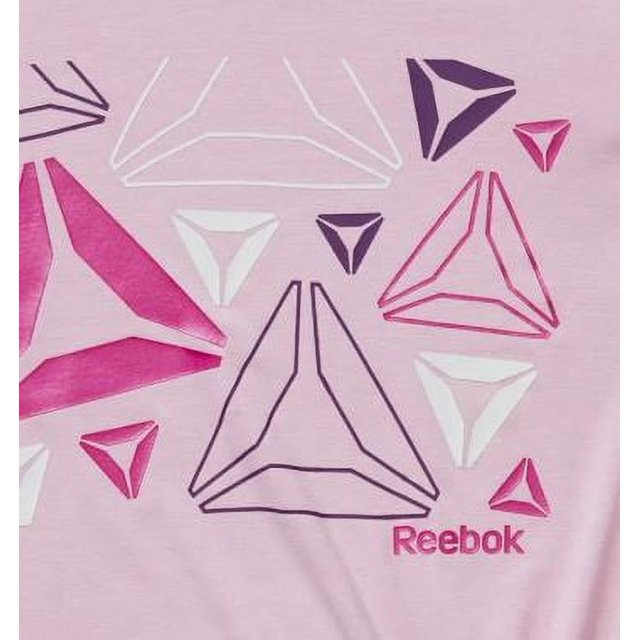 المقاس: XL (14-16 سنة) - تي شيرت ريبوك للبنات برباط جانبي ورسومات جرافيكية