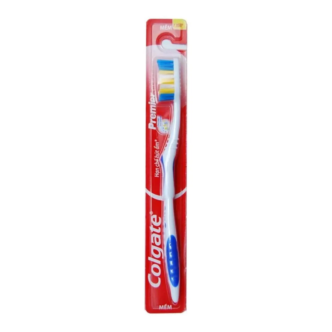 Close-up photo of a purple Colgate Classic toothbrush with medium bristles. Text highlights "Deep Clean" and "Vibrant Color