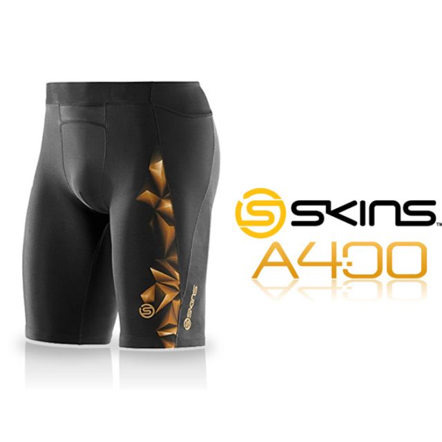 شورت Skins A400 نصف ضيق باللونين الأسود والذهبي