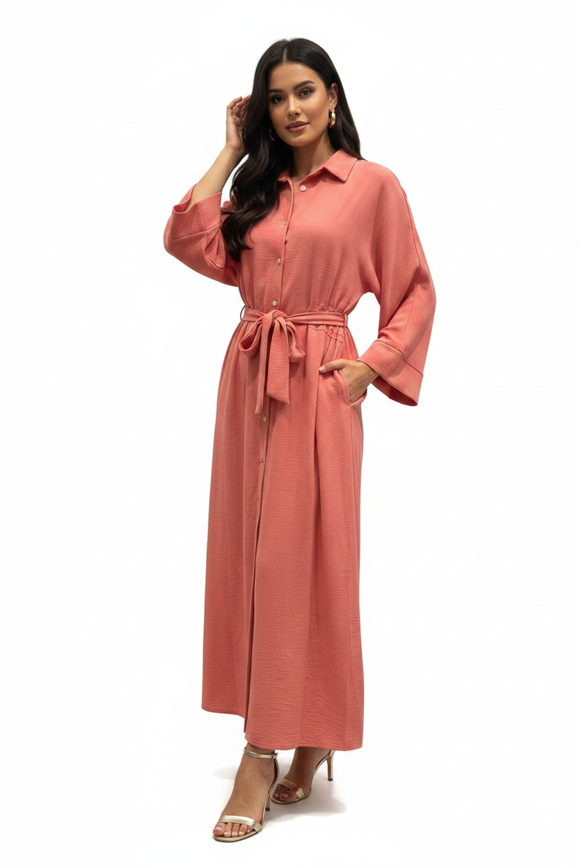 Woman wearing coral shirt dress