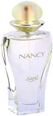 Sapil Nancy Fragrance for Women - 50ml bottle displayed on a mirrored vanity with soft pink roses.