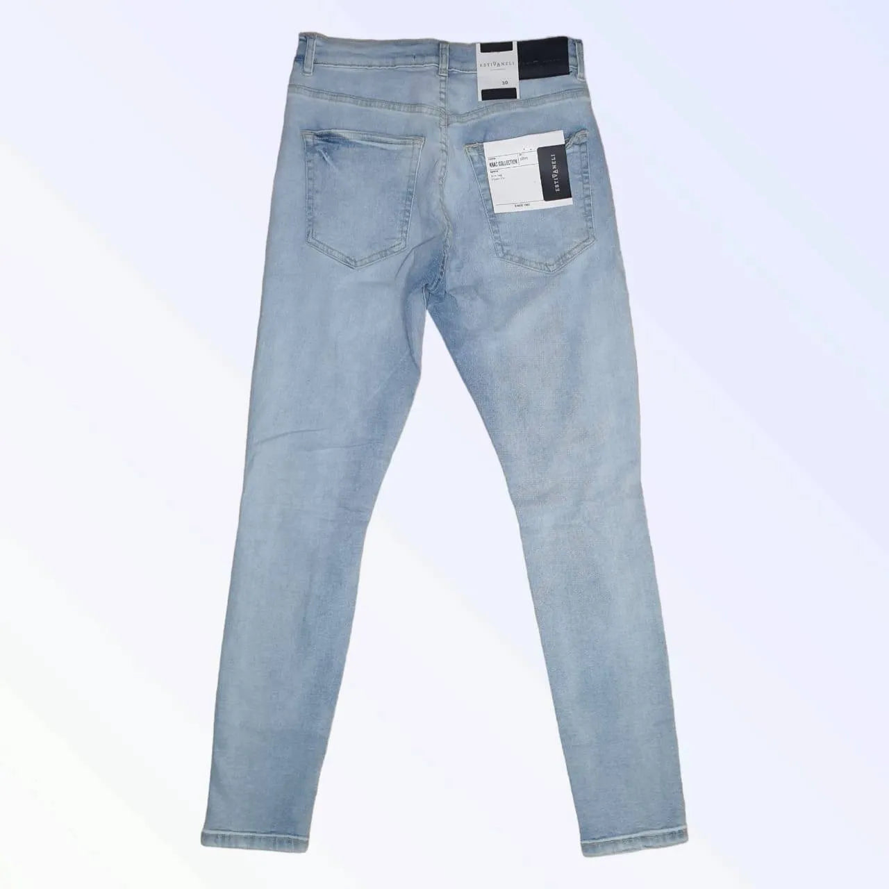Estivaneli Ripped Jeans: Elevate your look with stylishly distressed denim (mention size if relevant).Express your individuality with unique rips and distressed details.Estivaneli, distressed denim, stylish, edgy, comfortable, statement piece.