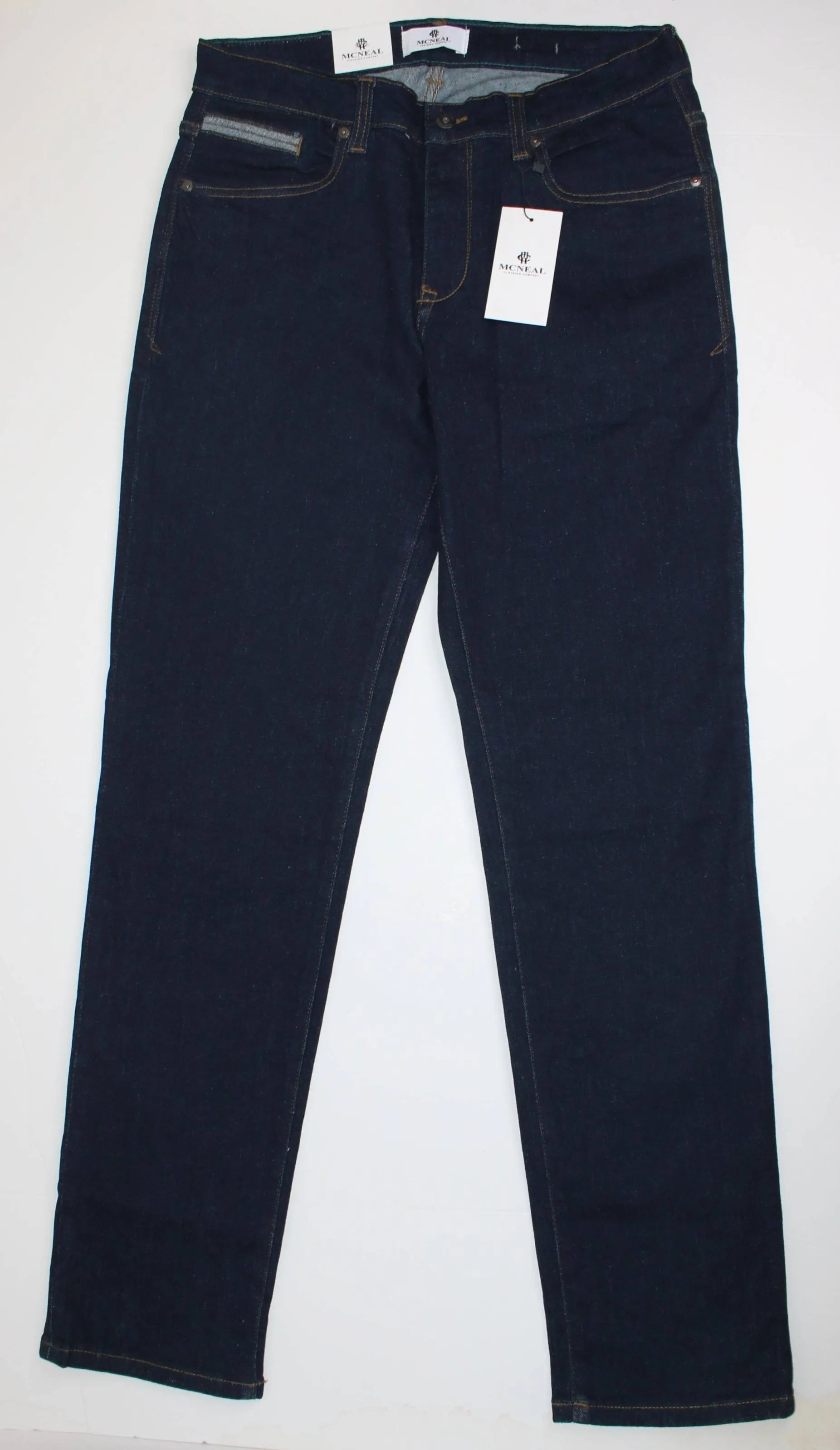 Mcneal Jeans: Dark blue denim, comfortable & stylish for any occasion (mention size if relevant). Designed for comfort without sacrificing a sharp silhouette.dark blue, denim, comfort, style, versatile, everyday essentials.