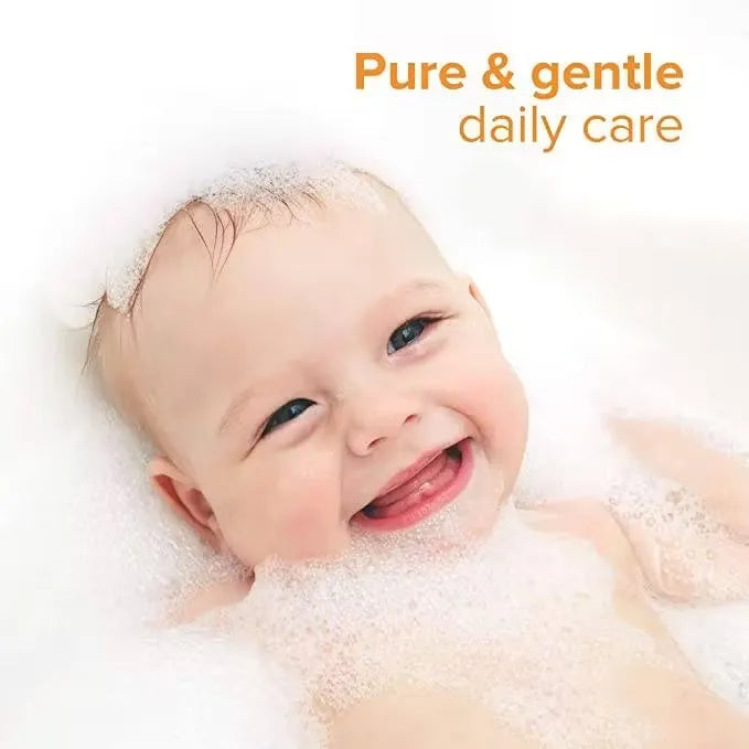 Blue bottle of Johnson's Baby Shampoo Pure & Gentle Daily Care (300ml) with pump dispenser and gentle tear-free formula.