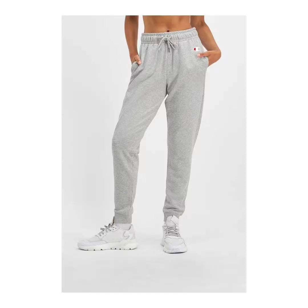 Champion women's grey track pants for comfort and style. Features cuffed ankles and iconic logo. Shop on Dubailisit!