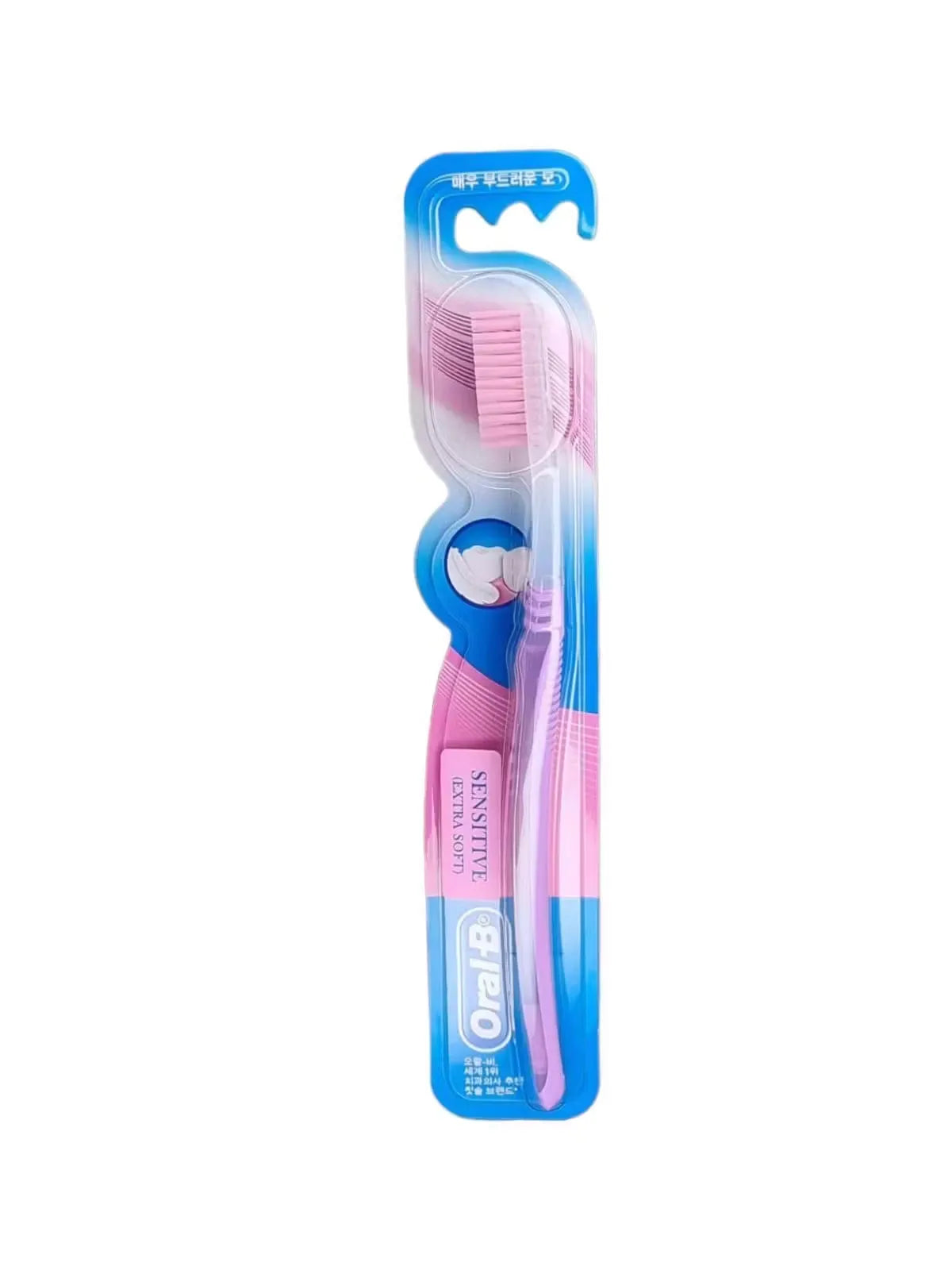 Close-up of Oral-B Sensitive Extra Soft toothbrush in a soothing purple shade. Features rounded bristles and ergonomic handle for comfortable cleaning.