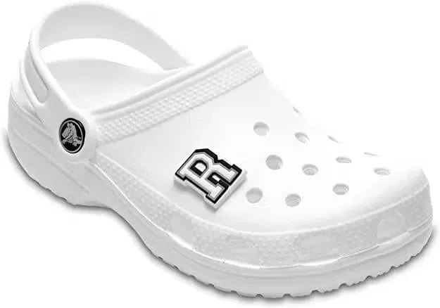 White glow-in-the-dark letter R charm shaped like a Crocs logo, designed to fit into Croc shoe holes.