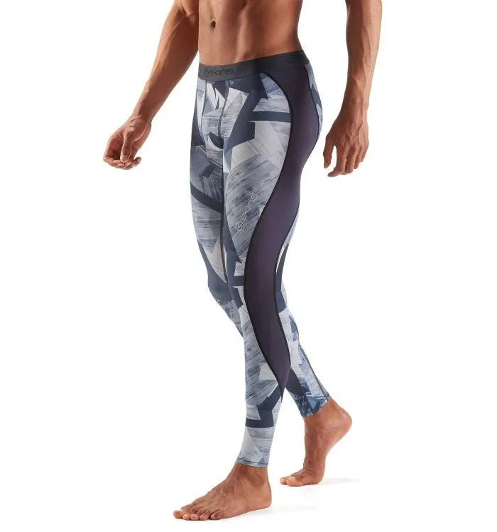 Stylish & functional: Train harder in these Skins DNAmic tights, featuring Havana Blizzard design and performance tech.