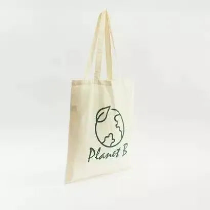 Gloo Planet B printed fold-up shopper bag made from sustainable materials. Bag is folded and displayed against a white background. Gloo Planet B eco-friendly shopper bag with colorful print, folded compactly on a white background. Perfect for reducing plastic waste.