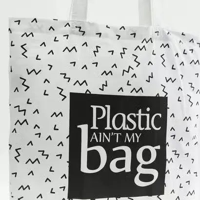 Gloo Planet B printed fold-up shopper bag made from sustainable materials. Bag is folded and displayed against a white background. Gloo Planet B eco-friendly shopper bag with colorful print, folded compactly on a white background. Perfect for reducing plastic waste.