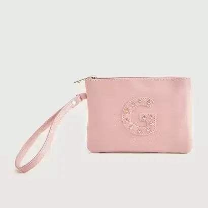 Gloo Studded Alphabet G Pouch, open with zipper visible. Silver pouch with black studs forming the letter 'G'. Wrist strap attached with tag.