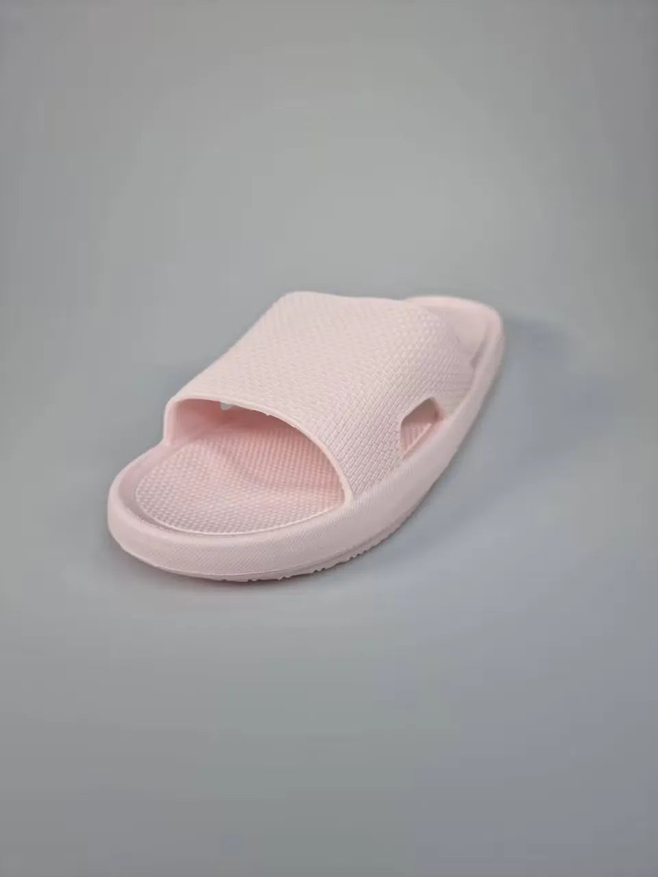 Light pink Summar slippers for women, featuring a plush memory foam footbed and flexible sole. Ideal for indoor and outdoor comfort.