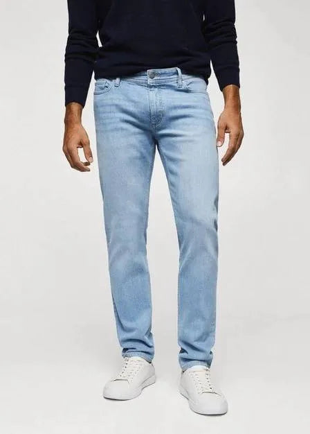 Mango Slim Fit Jeans: Timeless blue wash, designed for a sharp & flattering look (mention size if relevant). Designed to hug your legs comfortably for a defined silhouette.slim fit, blue, comfortable, stylish, versatile, wardrobe essential.