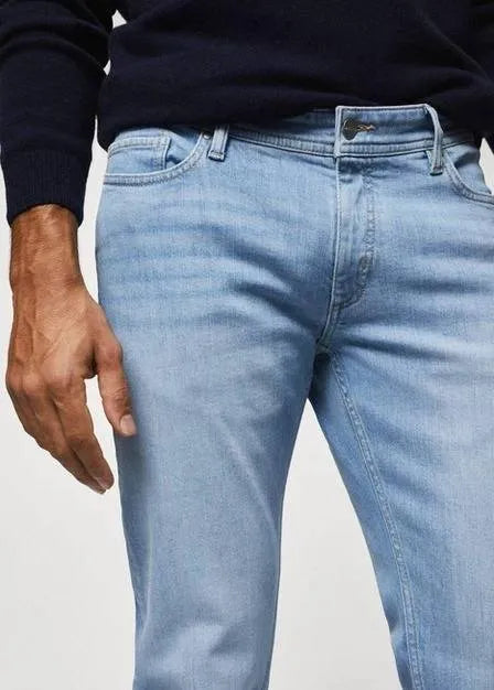 Mango Slim Fit Jeans: Timeless blue wash, designed for a sharp & flattering look (mention size if relevant). Designed to hug your legs comfortably for a defined silhouette.slim fit, blue, comfortable, stylish, versatile, wardrobe essential.