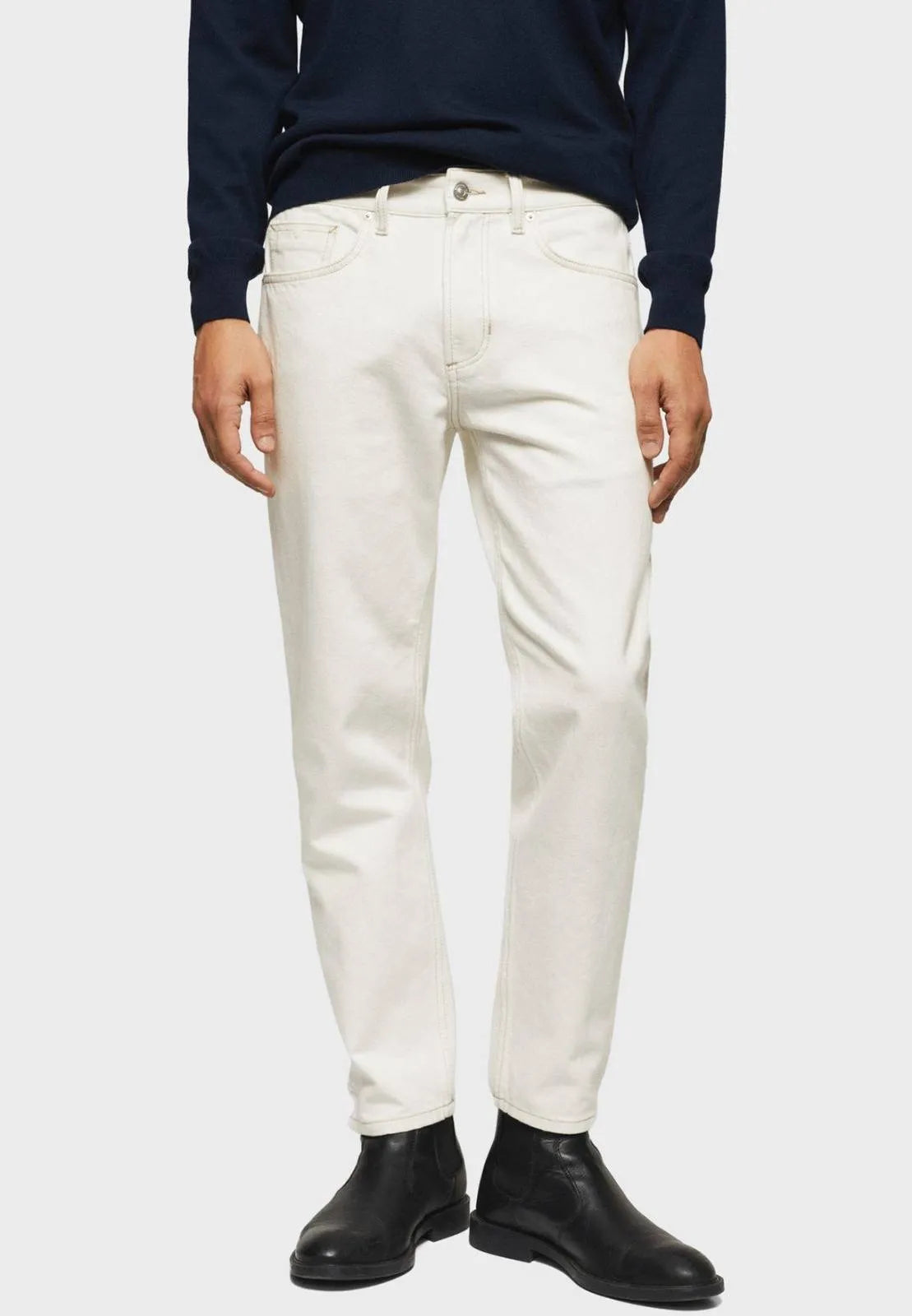 Mango Man White Jeans: Crisp & clean, straight-fit for a relaxed look (mention size if relevant).Straight-leg design complements different body types.rise wash, straight fit, relaxed, summer, versatile.