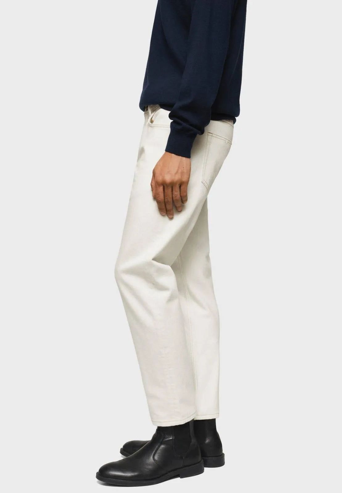Mango Man White Jeans: Crisp & clean, straight-fit for a relaxed look (mention size if relevant).Straight-leg design complements different body types.rise wash, straight fit, relaxed, summer, versatile.