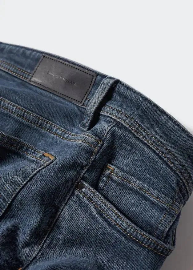 Mango Jan Jeans: Slim-fit comfort meets stylish denim (mention size if relevant). Designed to hug your legs comfortably for a sharp silhouette.slim-fit, comfortable, stylish, versatile, denim essentials.