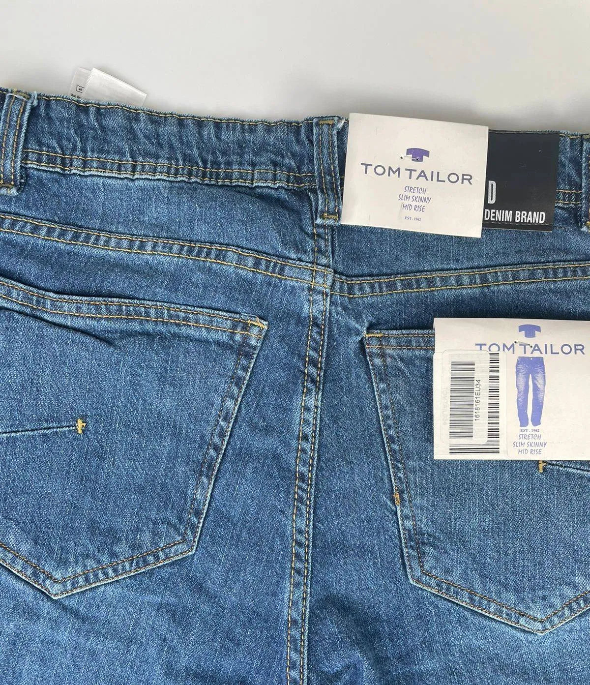 Tom Tailor Skinny Jeans: Elevate your style with flawless fit & crisp blue wash. (mention size if relevant)Designed to hug your legs comfortably for a sharp silhouette.Tom Tailor, slim skinny, blue, comfortable, stylish, everyday wear.