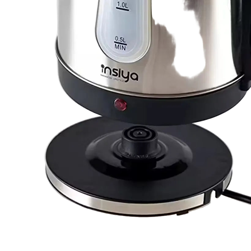 Insiya 1.8L electric kettle pouring water into a mug, highlighting its convenient spout and rapid boiling. Upgrade your kitchen with the stylish Insiya 1.8L electric kettle, featuring fast boiling and a premium design.