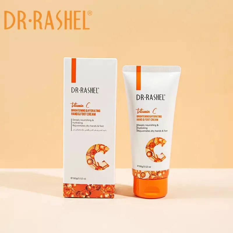 Close-up of Dr. Rashel Vitamin C Hand and Foot Cream 100g tube with orange accents and orange illustration. Cream being squeezed onto hand.