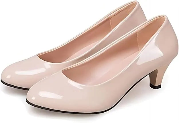 Beige Kitten Heels: Office chic meets comfort with these closed-toe, pointed-toe beauties (mention size if relevant).Walk confidently throughout the day with the perfect height and support.Kitten heel, closed toe, pointed toe, office wear, versatile, comfortable.