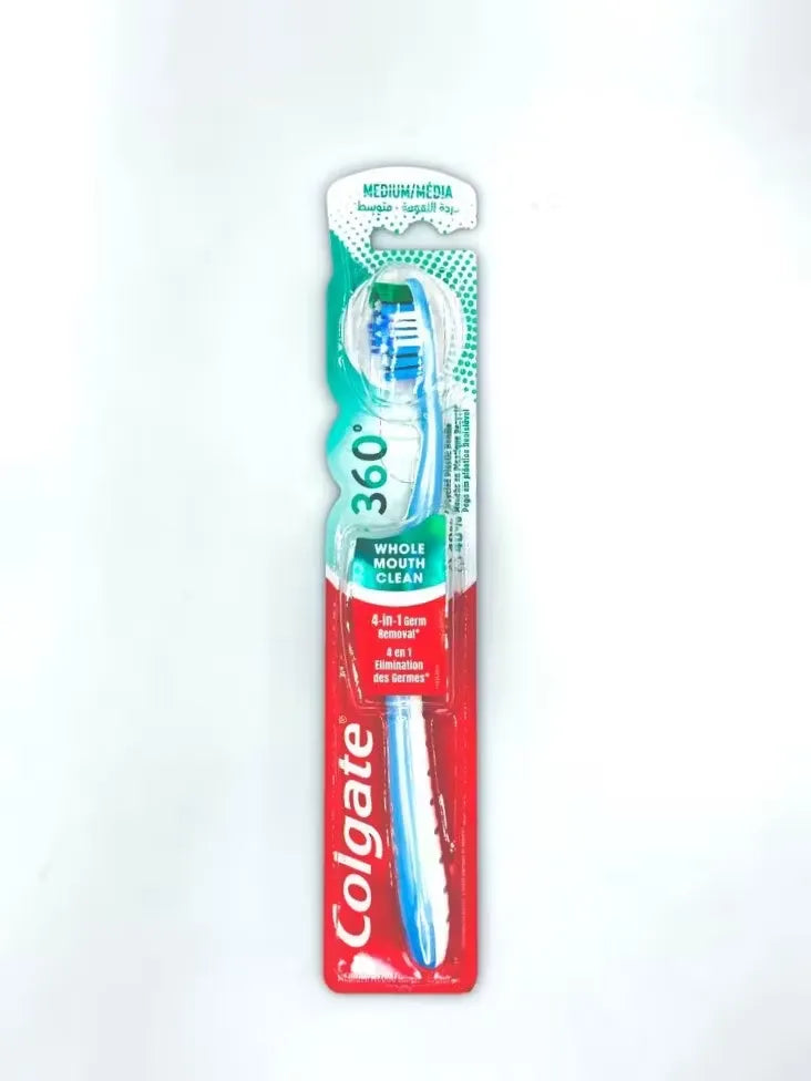 Close-up of a Colgate 360 Whole Mouth Clean toothbrush in brilliant blue, featuring medium bristles and a tongue cleaner.