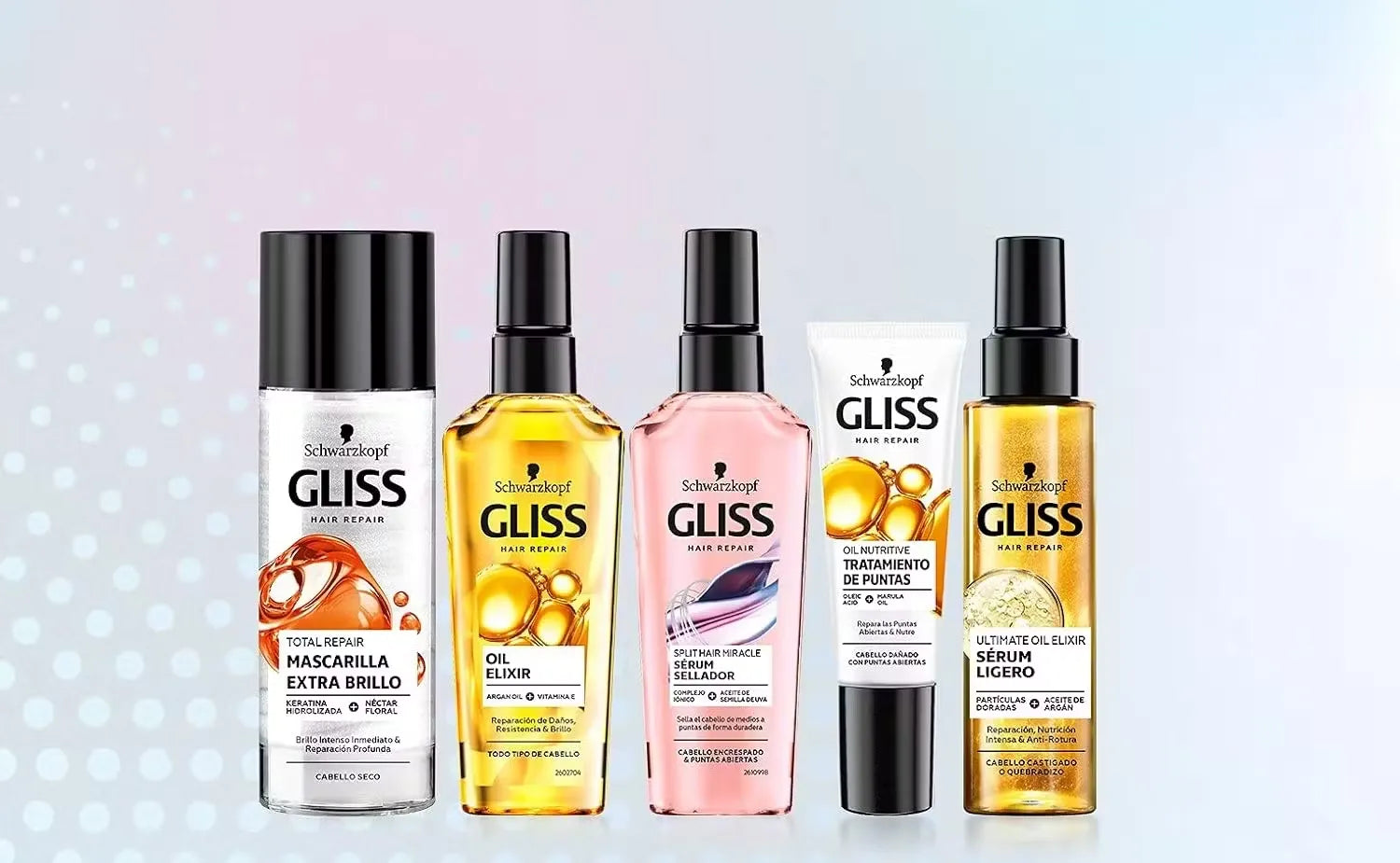 Sleek, silver bottle of Schwarzkopf Gliss Ultimate Oil Elixir (100ml) with a dropper dispensing golden oil onto a woman's healthy, shiny hair.