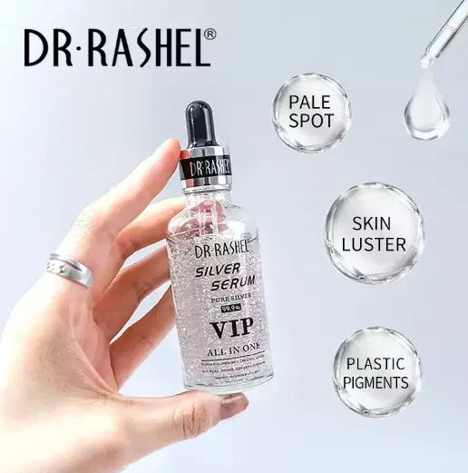 Close-up of a silver bottle with blue label and dropper dispenser, labeled "Dr. Rashel Silver Serum 99.99% Pure Silver VIP All-In-One Skincare - 50ml." Droplets of serum falling onto a person's hand.