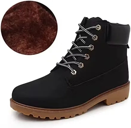Black women's fashion snow boots with stylish ankle design. Perfect for keeping warm and looking good in winter weather. Shop Dubailisit!