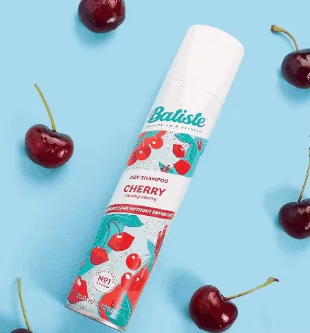 Pink and white can of Batiste Dry Shampoo in Cherry fragrance (200ml) with a burst of cherry graphics.