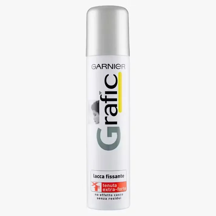 Silver can of Garnier Grafic Lacca Fissante Extra-Forte hairspray (250ml) with a woman confidently flipping her hair.