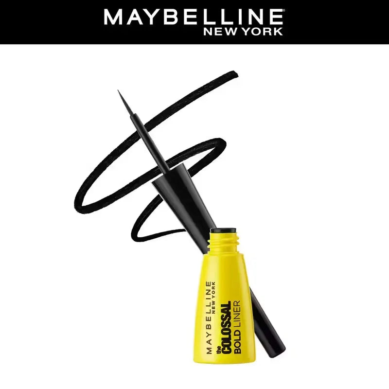 Close-up photo of Maybelline New York Colossal Bold Eyeliner pen in black with gold accents, held against a white background.