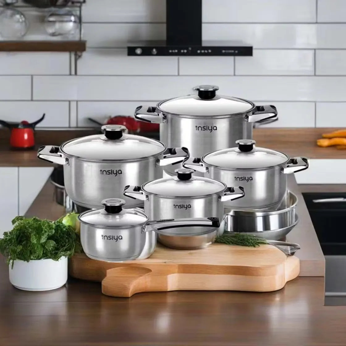 Insiya 10-piece stainless steel cookware set for confident cooking.  Master every meal with this versatile and stylish cookware set.  Durable and easy-to-clean pots and pans for everyday use. Includes: list items (pots, pans, lids, etc.)  High-quality stainless steel construction for even heat distribution. Highlight specific pieces in the set, like a large casserole dish.