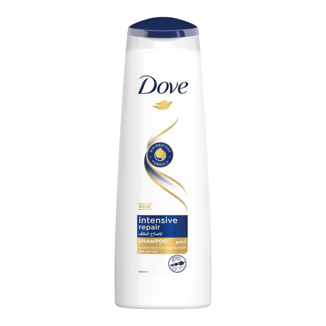 Close-up of Dove Intensive Repair Shampoo bottle (400ml) with blue label and gold accents. Woman with healthy, flowing hair smiles in the background.