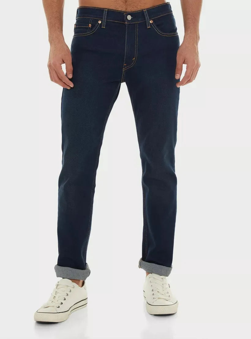 Levi's Slim Fit Jeans: Timeless style meets modern comfort in this mid-rise blue wash.Levi's, blue, slim fit, mid-rise, classic, modern, casual.From day to night, these Levi's jeans move with you.
