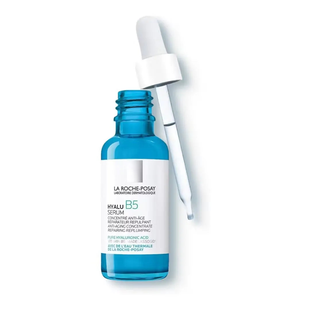 Close-up photo of a La Roche-Posay Hyalu B5 Serum bottle (30ml) with blue dropper, highlighting the product name and key ingredients.