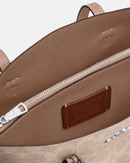 COACH NEW YORK حقيبة يد نسائية Mollie Tote 25 من القماش المطبوع SV / رمل / توب