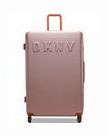 حقيبة سفر صلبة بعجلات DKNY Promo Intl PM1 للجنسين مع عجلات دوارة بلون برايم روز